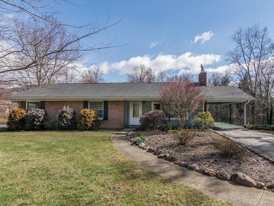 Haw Creek rancher has it all: Location. Living Space. Lot Size. 3 BR, 2-1/2 BA, open dining/living w/fireplace; large kitchen; master on main. Downstairs: Family room, bonus room, half bath, and project/exercise room w/fireplace. Drive-in basement garage, storage rooms & workshop. Huge, fenced back yard: Wraparound drive/patio perfect for recreation. Open, flat yard offers space for gardening, play or pets. Lot is likely dividable per RS4 zoning specs (buyer to confirm). Don’t miss your chance!