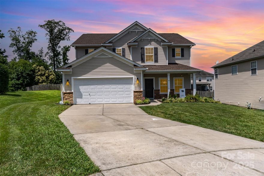 Nestled on cul-de-sac, this beautifully updated home offers style and comfort. The welcoming covered porch leads you into an open layout, where you'll find stunning luxury vinyl plank floors throughout the main living and in the loft upstairs. The family room is highlighted by a beautiful built-in and cozy fireplace, perfect for relaxing or entertaining. The updated kitchen is a chef’s dream, featuring sleek quartz countertops, stainless steel appliances to include double ovens, microwave and dishwasher. Off the kitchen, the laundry room and pantry offer practical shelving for easy organization. The primary suite boasts a tray ceiling, creating an elegant atmosphere, while the ensuite bathroom has been completely renovated with quartz countertops, LVP flooring, dual vanity, beautifully tiled walk-in shower, and walk-in closet. Every inch of this home has been thoughtfully updated. Plus, the covered porch and the fenced-in backyard with a storage shed adds both privacy and convenience.