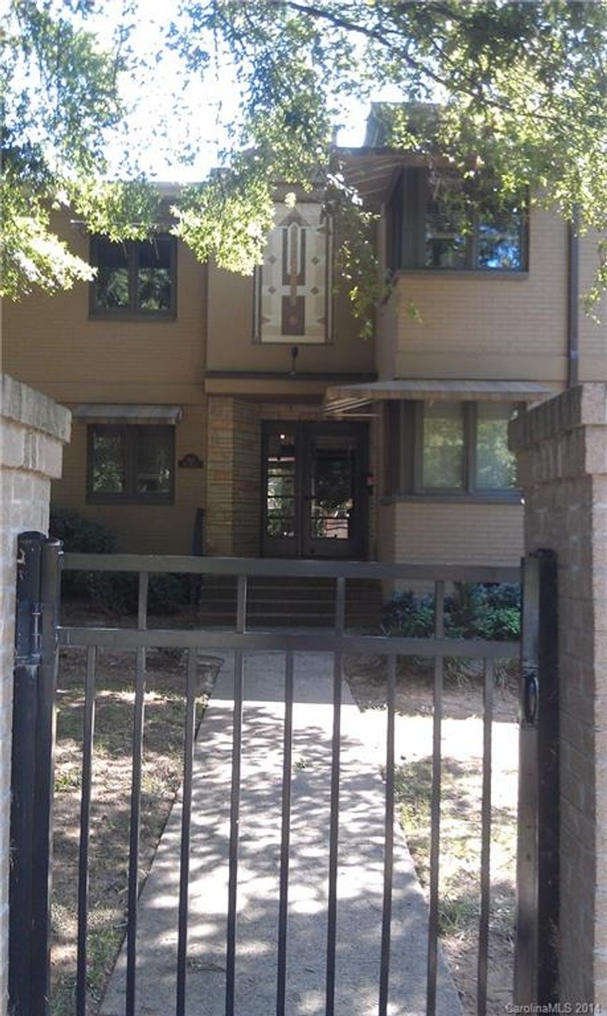 2 BR/1 BA Art deco style condo in Elizabeth with Berber carpets in bedrooms, hardwoods in living area. Washer/dryer in unit, updated appliances and granite countertops. Water, trash and internet included in rent. Fenced community, secure buildings with passcode entry. Pool, clubhouse and fitness center on site. Great location. Gated parking and additional parking on street.  Carpets will be professionally cleaned before tenant move-in.