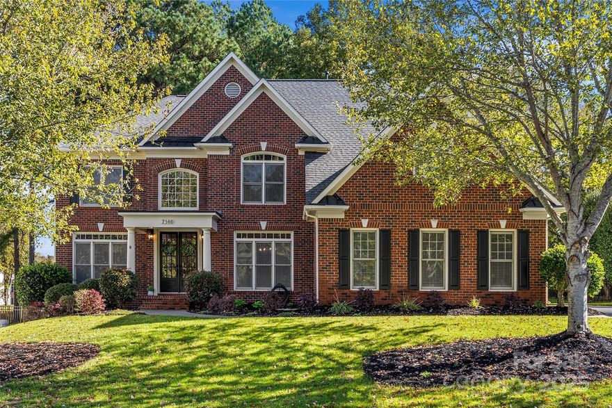 Extensively improved, move-in ready John Weiland home in Bridgemill with major 2026 updates completed, offering nearly 5,000 sf across 3 finished levels in one of Indian Land’s most desirable communities. This 5-bedroom, 4-bath home blends timeless architecture with major recent investment, including replacement of most windows, crawl space remediation, exterior siding repair and paint, and numerous system updates. A bright 2-story foyer and graceful curved staircase welcome you to a light-filled interior. Main level features formal dining, full guest suite, flexible office or living space, and spacious great room with gas fireplace & built-ins opening to a white gourmet kitchen with tile backsplash, pot filler, stainless appliances, and breakfast area overlooking the backyard. Upstairs, the primary suite offers sitting area, 2 walk-in closets, renovated spa-inspired bath, and flex space ideal for office, gym, or studio. Three additional bedrooms include a private suite plus Jack & Jill layout. 3rd-floor bonus room offers ideal media, play, or workout space. Private fenced backyard includes deck, patio, firepit, and waterfall pond. 3-car side-entry garage. Bridgemill amenities include resort-style pools, clubhouse, tennis, trails, playgrounds, & social activites. Minutes to Bridgemill Commons, Target, Lowe’s Foods, Costco & the upcoming MUSC Health hospital corridor.