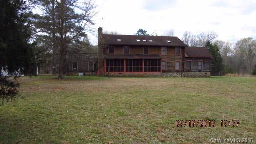 All auction properties are subject to a 5% buyer’s premium with a minimum of $2,000 and subject to a reserve price as well as seller confirmation. No minimum starting bid required.  Seller has the right (a) to change the date, place, and terms of the sale; (b) to remove the property from the market; and (c) to sell the property prior to the sale. Large log cabin. 2 acre private lot. Property is being auctioned Sight Unseen, it is landlocked and No Showings.