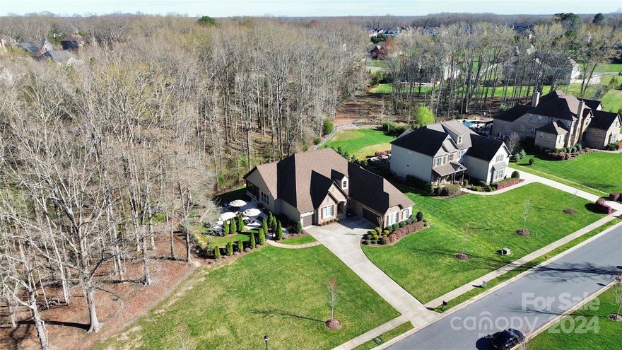 This is a HOME-Custom 4 Bedroom 3.5Baths Toll Brothers Ranch Home Ready to Move In ! Oversized Lot with Plenty of Privacy - An Architecturally Designed Foyer Welcomes you to this Wonderfully OPEN Floor Plan Leading You to A Large Great Room With Raised Custom Fireplace-This Openness Connects you to a Spacious Island in this Expanded Kitchen with Breakfast Area and Desk Area-Jenn-Aire Appliances Includes Gas CookTop with Pot Filler Faucet - there is an Expanded Pantry with Custom Built-ins-9 Ft Sliding Doors Leads you to a Large Sunroom with Easy Breeze Windows-Travertine Tile Floors and a Beautiful Electric Fireplace with Custom Surround. There is a Dining Room with a Butlers Pantry,Wet Bar,Wine Rack ,and Wine Refrige and Custom AV Closet! Oversized Owners Suite(Expanded from Original Plan) has Coffered Ceiling with Custom Lighting & Crown Moulding-Barn Doors Lead you to the Owners Bath with Oversized Shower with Dual Shower Heads and Rainmaker. You Must SEE THIS HOME-CK ATTACHMENTS.