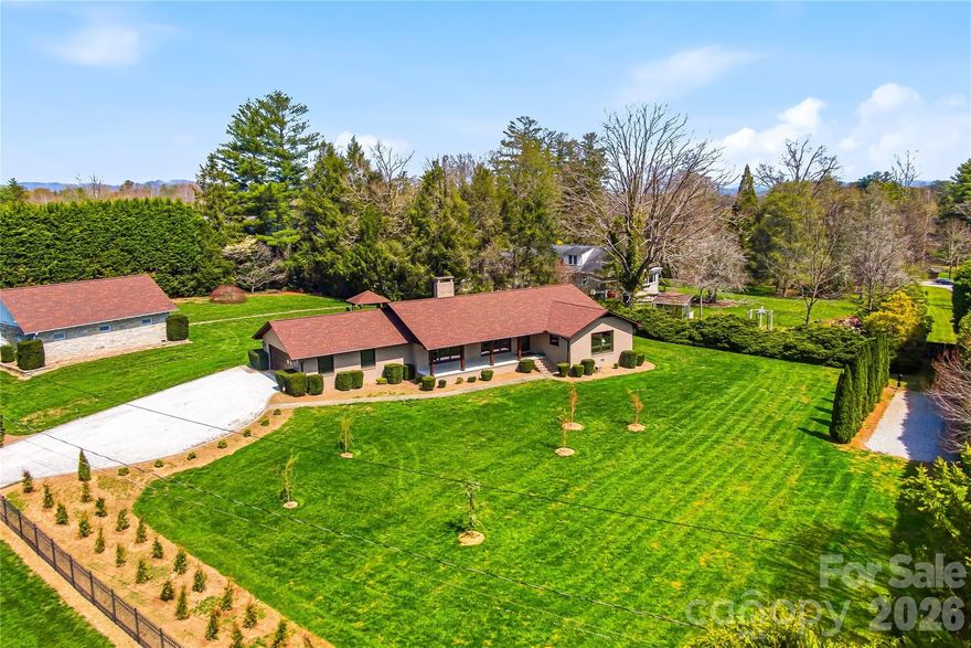 Welcome to 910 Rutledge Annex, an exceptional property that blends charm, space, and convenience just minutes from downtown Hendersonville. Set on a generous, picturesque parcel, this property offers a rare opportunity to enjoy peaceful, semi-rural living without sacrificing proximity to shops, dining, and everyday amenities.

The home itself features beautifully updated finishes throughout, creating a warm and inviting atmosphere that’s move-in ready while full of character. Thoughtfully designed for comfort and peace of mind, the property is equipped with a whole-house generator and a 500-gallon propane tank, ensuring reliable, efficient living year-round. The primary suite offers a touch of luxury with heated floors in the master bathroom, creating a spa-like retreat.
One of the standout features is the stunning stone barn—functional and full of rustic appeal—ideal for storage, hobbies, or bringing your small farm vision to life. The property is thoughtfully equipped for a variety of lifestyles, including a dedicated RV parking pad and ample open space for expansion.
For those dreaming of a homestead lifestyle, this property delivers with room for horses, a chicken coop, and expansive garden areas to grow your own food or cultivate a peaceful outdoor retreat. Mature trees and open green space provide privacy and scenic beauty, making it easy to relax and unwind.
Whether you’re looking for a hobby farm, a private retreat, or a versatile property with room to grow, 910 Rutledge Annex offers a balance of comfort, functionality, and natural beauty—all in a desirable location.