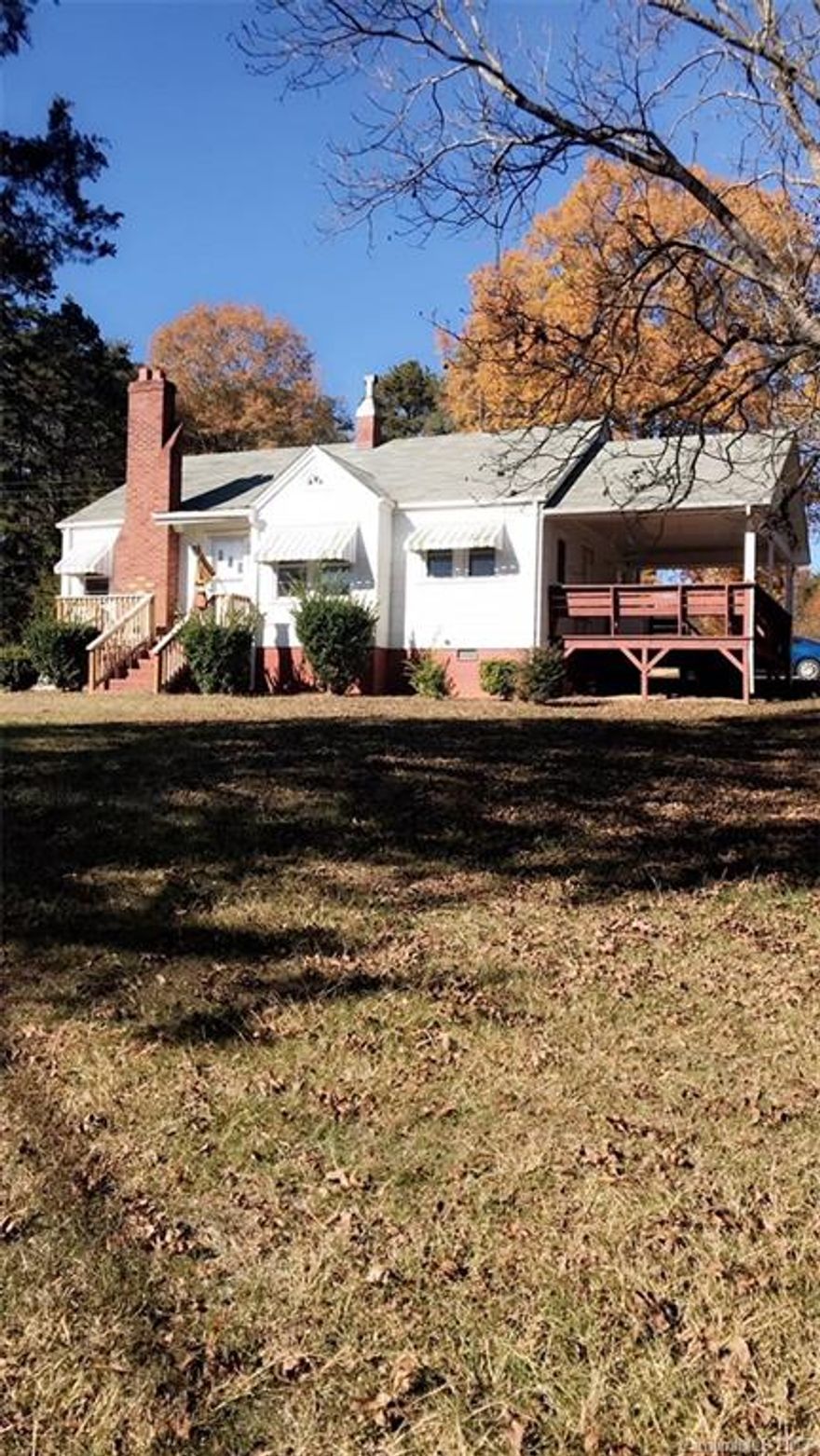 Sweet country settings on 3.1 acres! Property offers a 2 Bed/1 Bath home with large living room and spacious bedrooms. This layout has great potential. The Large side deck is perfect for entertaining guest. This home is just a short drive to town. Detached garage and storage area. Come see today! Priced to Sell! Won't Last Long! Welcome Home!