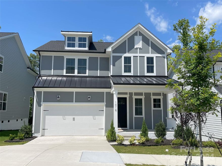 Located in the wooded enclave of the Tennyson community in Matthews, this newly constructed home overlooks a picturesque scene. Listening to birdsong, feeling the cool breeze, and experiencing the ethereal beauty of nature.

The main floor features 10' ceilings and 8' doors with luxury vinyl plank flooring throughout. The kitchen boasts quartz countertops and a huge island with an open floor plan. With 4 bedrooms and 3.5 baths, spacious living is guaranteed. Enjoy ample storage, new SS appliances, designer lighting, and a luxury spa shower. The custom patio with pavers and upgraded landscaping adds to the appeal. Brand-new refrigerator and washer/dryer included.

Great location! Just 10 miles from Uptown Charlotte, a couple of miles from shopping, dining, and schools, and a short walk to Irvins Creek Greenway. This elegant and comfortable home is truly your dream one! Be the first to live in it and start your great journey in the Queen City.