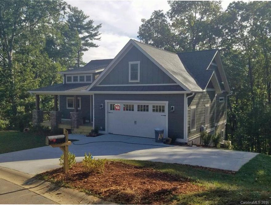 New construction home sold as a lot/home package in new craftsman style community close to all South Asheville conveniences. This home features a bright & open floorplan with vaulted T&G ceilings in the great room w/stone fireplace, hardwoods floors throughout main level & lower lvl, kitchen features granite counters & stainless appliances, master on main w/oversized walk-in closet, covered back porch overlooking private yard w/creek & mountain view. Taxes based off land only, total taxes TBD.