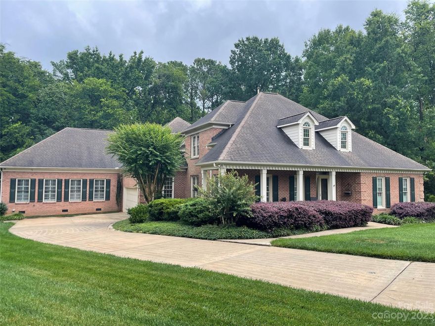 This Beautiful home is AMAZING! The main house offers Living room, Dining Room, Kitchen with Breakfast room, Great room w/ fireplace/gas logs & overlooks the sunroom which overlooks the in-ground salt water pool. Master on main. Upper Level has Three Bedrooms &  bonus room. The 2nd LIVING Q has two entrances with over 1300 plus sf. A huge Great Room, full kitchen, breakfast bar & breakfast area, 2 nice size bedrooms & 2 full baths. This home & 2nd living have an abundance of windows. THREE H/A units. Office over 2nd LQ AND TONS OF Storage It is truly AMAZING & A MUST SEE -Asheford Green is located next to the country club & close to Hwy 29, I-85, shopping & much more. 
Sellers Additions:
In-law suite/office/storage addition-In ground salt water pool-Artificial turf around the pool 6 foot privacy fence-19x14 screen porch w/ EZBREEZE windows-Hardwood floors installed on 2nd floor-Interior & Exterior painted- Pella Window replacements throughout house-Crawl space encapsulation- Gas Logs