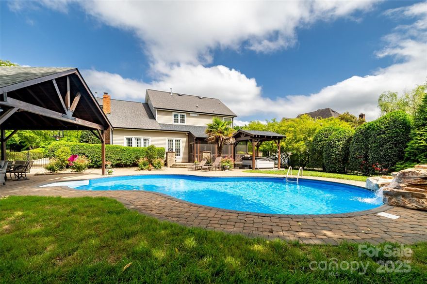 Welcome to your dream home in the desirable Foxlaire community! This beautifully updated 5 BR 3 BA home offers 2,645 square feet of stylish living space, blending modern upgrades with classic charm. Step inside to find a bright and open layout featuring board and batten accents, a striking stone fireplace, and a dedicated office/flex space—perfect for remote work or study. The heart of the home boasts a spacious kitchen and living area that flows effortlessly into a large screened-in porch and patio, ideal for relaxing or entertaining guests.
Outside, enjoy your own private oasis with a sparkling heated pool set in a lush, fenced backyard—designed for unforgettable gatherings or quiet weekend retreats. The fully encapsulated crawl space adds long-term value and peace of mind. All appliances & hot tub convey! All new plumbing with 10yr warranty 2025. Located just minutes from top-rated schools and Dorton Park, this home offers the perfect combination of comfort, style, and convenience.