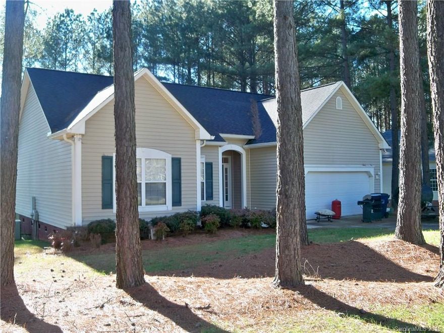 3 bedroom 2 full bath home located in on a wooded lot with a large yard. Vaulted ceilings, gas logs, split floor plan. 2 car attached garage, storage shed and a nice deck. Give me a call if you would like to tour this home!