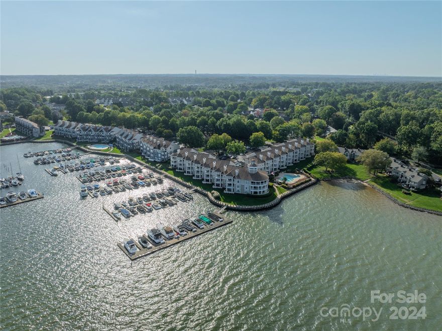 Step into luxury waterfront living located at the highly sought after Vineyard Point / The Moorings and begin your best life. Enjoy the expansive lake views while resting in the primary bedroom or sipping coffee on the back deck. Enjoy the stunning sunset views and immense attention to detail throughout. Take a dip in the lakefront community pool after playing pickleball at the tennis courts. For those cool Fall/Winter evenings, cozy up in front of the wood burning fireplace while enjoying your favorite shows. New LVP flooring and stone around the fireplace in 2021. New built-in bar and kitchen cabinets 2021. New granite countertop 2021. New Heat Pump/Air Handler/Thermostat 2022. New insulated windows and sliding glass doors 2023. This incredible waterfront gem won’t last long. **All furnishings are available for purchase**