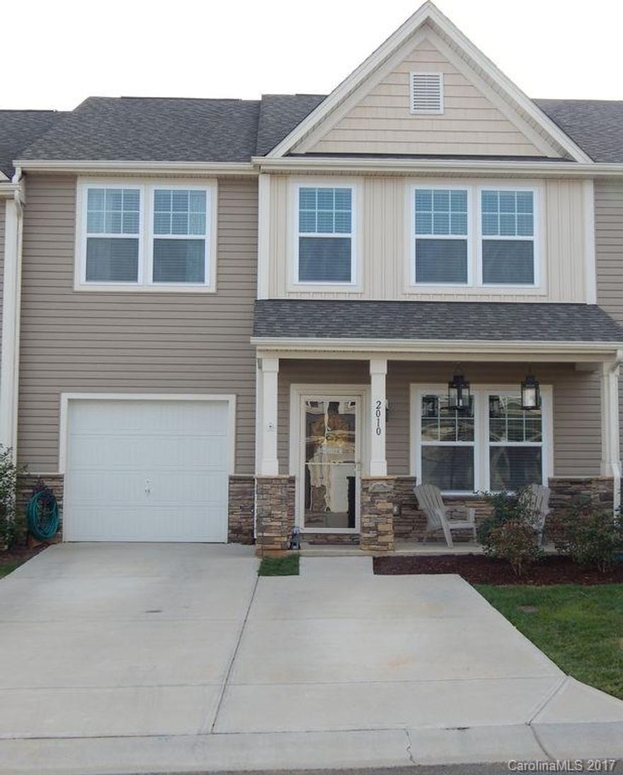 BEAUTIFUL 3 BR, 2 1/2 BA Townhouse With One-Car Garage in Fort Mill! Amazing upgrades including Granite Countertops and Hard Wood Floors. Deluxe Kitchen with Stainless Steel appliances and Eat-In Island. Butlers Pantry! Awesome Private Patio. Walk-In Closet in Master. Ceramic Tile Floors in Bathrooms. Community pools, irrigation system, maintenance free lawn care and walking paths around neighborhood lake. Refrigerator, Washer and Dryer Included! All in Award Winning Fort Mill School Systems!