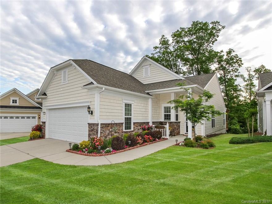 This Fox Run 2BR/2BA with sunroom is loaded with upgrades.  Granite, stainless appliances, hardwoods, plantation shutters, ceiling fans and crown molding.  The kitchen has an island and breakfast area. The deck has a pergola overlooking the woods.   Come check out the community and the active adult lifestyle of Sun City Carolina Lakes.