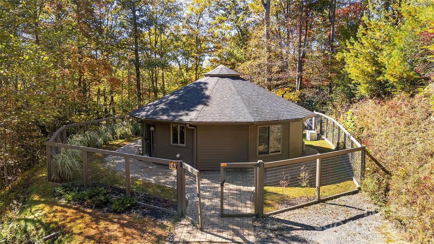 Escape to serenity with this immaculately maintained custom Deltec High Energy Efficient Home on 5.5 beautiful and private wooded acres minutes from Hot Springs. Sold turnkey - all furnishings, appliances, dishes and linens included. This one-of-a-kind Luxury Fishing retreat combines mountain living with modern comforts, featuring stunning woodwork, vaulted ceilings, custom built-ins, custom polished concrete, 600 foot well, mid-century pieces and windows that bring the beauty of nature indoors. Direct private access to Laurel River.  Outside, immerse yourself in the lush grounds, with hiking trails, scenic views, and plenty of space for outdoor activities such as trout fishing in the famous Laurel River.  Enjoy amazing views from your back porch and fire-pit. An easy, 15 minute drive to Hot Springs, 25 minutes to Greeneville TN, and 40 minute drive north of Asheville. Land and area has been spared from any major hurricane damage.