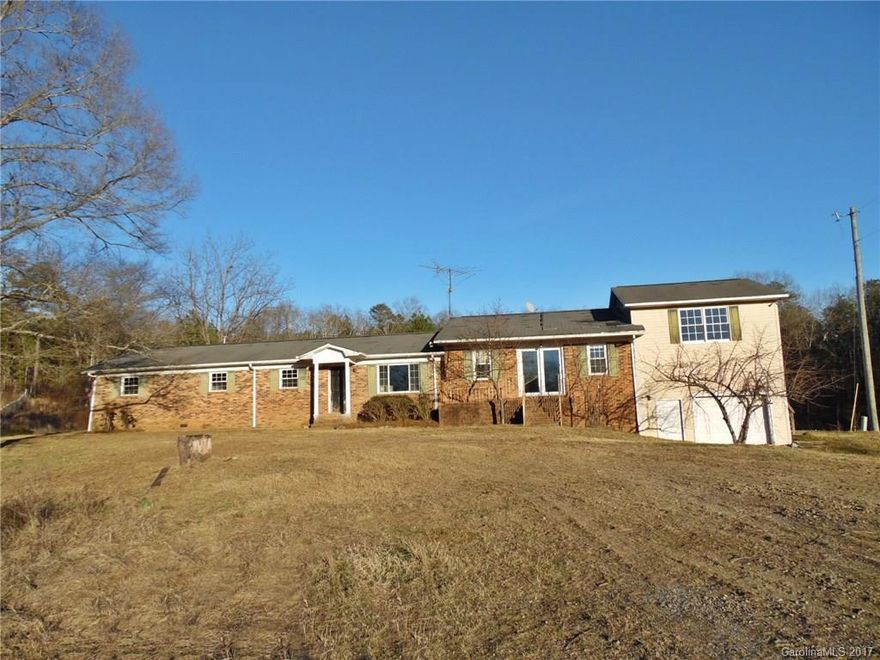 Situated on 38 acres, this unique home offers the opportunity for both single & multi family living. Original home has 3 Bd, office, formal dining, large family room & kitchen w/island. Addition has 1 Bd, kitchenette, bath & living space w/interior & exterior access. Basement offers a full bath w/entertaining area. Acreage features fenced pasture, 2 barns & plenty of room for horses! Strongly encouraged that offers include proof of funds/pre-approval & is required for seller's final acceptance.