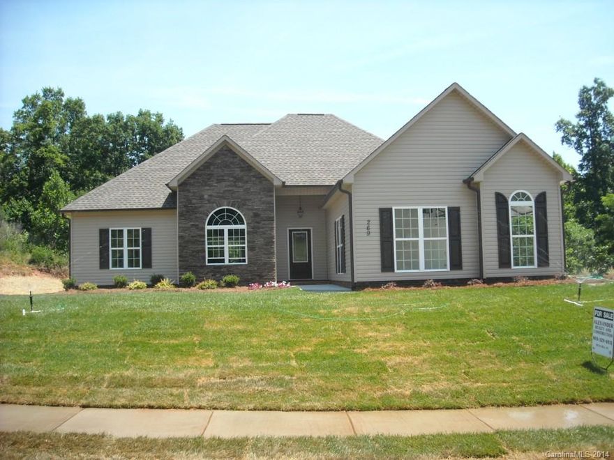 New home - Great split bedroom plan. Exterior stone @ dining room. Beautiful kitchen w/ granite counter tops, pendent lighting over bar area. Great room has 12 ft ceilings, corner fireplace (w/ mantle & hearth). Hardwood flooring throughout except 2nd/3rd bedrooms and baths. Master bath features garden tub w/ separate shower, double sinks, ceramics. Oversized patio. Nice lot. Sodded yard. Side entrance garage. Tons of upgrades