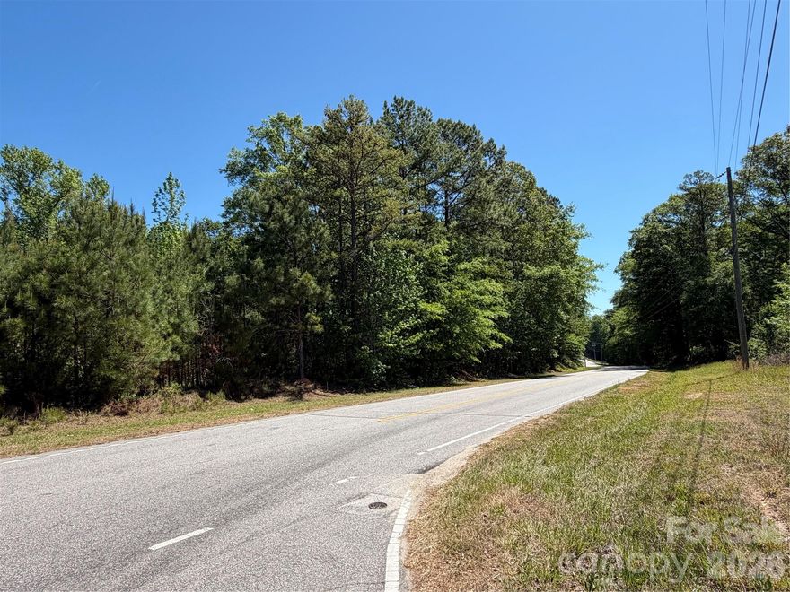 Endless possibilities with this 7.4-acre parcel in Lancaster, SC with scenic surroundings, ample space for gardens, outdoor living, and more! Zoned MDR and located in the county, this property is perfect for a private retreat, family estate, farm or development. County water and sewer available with tap and installation fees. Don’t miss this rare opportunity to own a slice of paradise in Lancaster, SC where your vision can come to life!