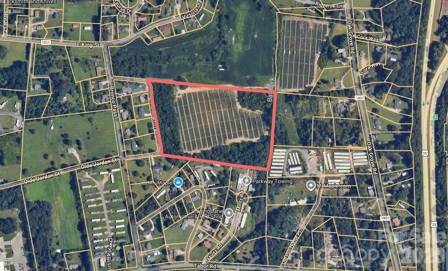 Zoned R-1, allowing up to 4 dwellings per acre, with additional flexibility for mobile homes, mobile home parks, and RV parks (mobile home and RV parks permitted via special use approval).

13.41-acre development opportunity in East Flat Rock, NC. This gently rolling property is well-suited for single-family homes or a potential mobile home or RV park concept, with a quiet setting, mature trees, and convenient access to both Hendersonville and Asheville. Located near US-176 and I-26, it offers a strong balance of privacy and accessibility. Public water and sewer may be available—buyer to verify with the county. Ideal for a subdivision, boutique community, or alternative housing development in a growing area.