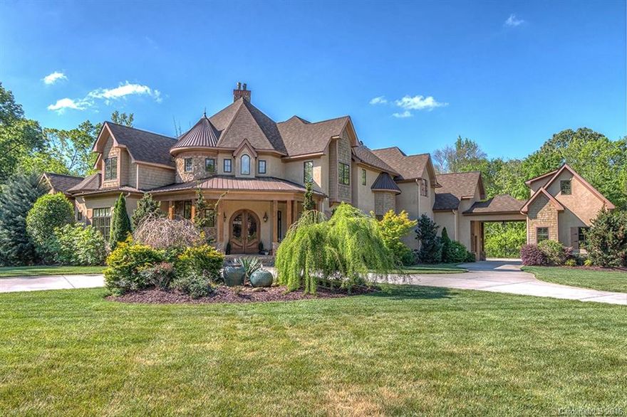 Stunning European inspired luxury estate on 2+acres in gated Weddington community. 9200+ htd & 1750+ unheated sq ft. Features: 20ft cathedral ceiling w/Post&Beam Douglas fir in Kit. Master Suite on main w/sitting rm, see-thru FP, bath w/mosaic glass tile & stone, slipper tub, vessel sinks. Add'l guest bdr on main. All bdr have an en-suite. Upstairs: addition of a bonus rm complete w/kitchenette. Lower level includes 2nd kitchen, media, work-out, full ba & entertainment area. Salt water Pool.