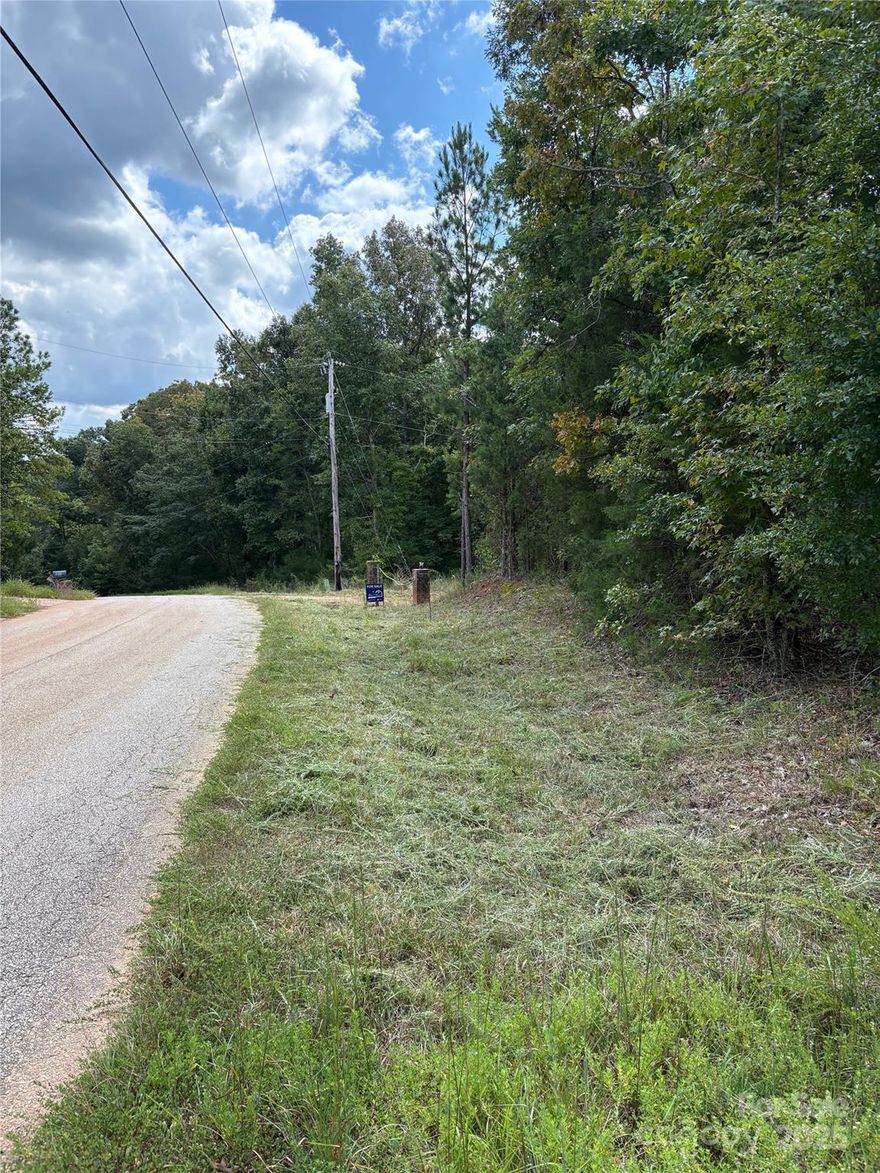 Looking for land with room to grow and explore? This 6.22-acre parcel offers the perfect blend of privacy, natural beauty, and potential. Tucked away in a peaceful rural setting, the property features an abandoned manufactured home—ideal for those looking to renovate, remove, or start fresh with a custom build.
One of the standout features of this property is the creek that runs through the land, adding charm, tranquility, and a touch of nature that’s hard to find. Whether you're dreaming of a homestead, investment property, or a weekend retreat, this land gives you the freedom to bring your vision to life.  No HOA or restrictions.  Located within easy driving distance of Lancaster, Waxhaw, Rock Hill and Indian Land.  Hwy 521 is less than 2 miles; Hwy 5 is 3 miles,  making it convenient yet secluded.  Property is being sold AS IS.