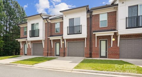 Photo of 4010 Waiting Street #TH1, Matthews, NC 28105 (MLS # 4314741)