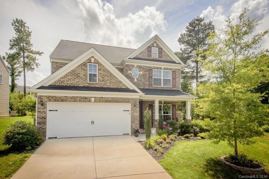 Loaded Berewick home full of upgrades and views of Lake Wylie. Beautiful 5bed, 3bath home with guest bedroom on main floor. Home situated on private, corner lot.  Fenced yard with no neighbors directly behind. Hardwoods thru downstairs. Kitchen with granite, stainless appl, Refrigerator stays.  Moldings and details thru house. Full brick masonry front. Home warranty included. Welcome home!