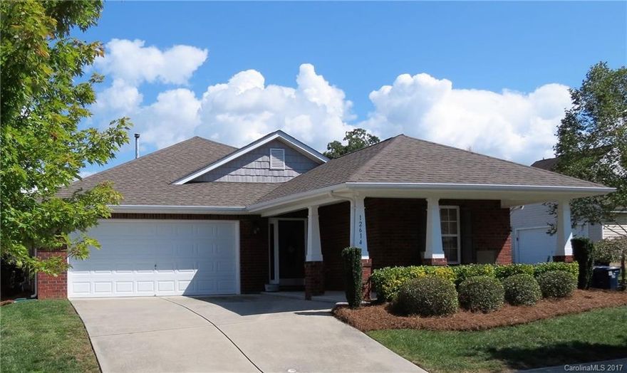 That perfect 1-story you've been looking for is here!  Full Brick, Split Floor Plan, Rocking Chair Front Porch, Hardwoods throughout the main area and Granite counters in the Kitchen and Baths!  Great working Kitchen with plenty of prep space, Granite, Stainless Steel Refrigerator and Dishwasher, Pantry and Tile Backsplash.  Large Master Suite with Tray Ceiling and Master Bath with Double Vanity, Separate Garden Tub and Shower.  Move-In Ready, New Interior Paint, this will not last long.
