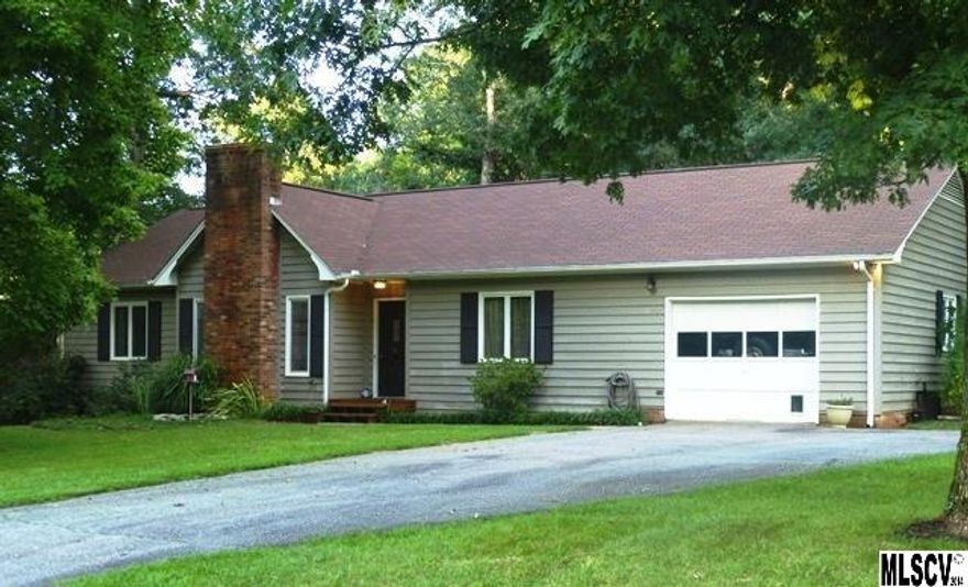 Move right in to this fantastic 3BR/2BA home. Great neighborhood in very convenient location close to lake, shopping, schools and more. This home features beautiful hardwood floors through out, updated interior paint colors, and a beautiful rock fireplace. Great lay out features spacious kitchen with plenty of storage, Split bedroom plan, large living room, and enclosed back porch over looking fenced in backyard-perfect for entertaining!