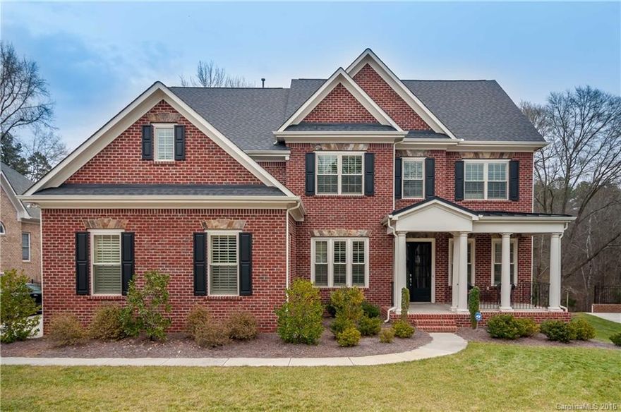 Gorgeous All Brick 3 Level Home w/Expansive Outdoor Living. Huge Paver Patio, Wood Burning FP,  Heavily Treed & Private Cul-de-sac Lot.  Heavily Appointed Formal LR & DR. Gourmet Kit w/Antiqued Glazed White Cabs, Granite, Work Islnd, SS Appl, Dbl Oven, Gas Range & Morning rm. Guest Br/Full Ba on Main. Hdwd Flrs thruout 1st level(except BR) Wrought iron spindles to 2nd flr w/Bonus. 3rd Flr with Tons of Flex Space- Bonus and Rec Rms, Brm and BA. Amazing Neighborhood Amenities! Why wait to build!