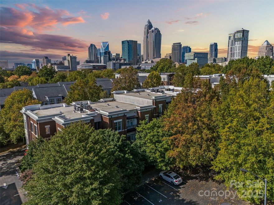 This stunning first-floor Uptown condo is located in the charming Garden District, only blocks from a neighborhood park or the greenway, and a short walk to a light rail stop. With new flooring in the main living areas and 12 ft ceilings throughout, it's move-in ready! The kitchen features granite counters, stainless steel appliances, under cabinet lighting, and is open to the living room. There's a patio off the living room with double glass doors for plenty of natural light. The large primary suite features dual vanities and a walk-in closet. Ideally located in Uptown, you're in a quiet neighborhood, but only a few blocks from Optimist Hall, Rosie's Wine Bar, the Sugar Creek Greenway, and the 9th St light rail stop. You also have easy access to 277, I-77, and all the neighborhoods surrounding Uptown. You'll love where you live; this is Uptown living at its finest!