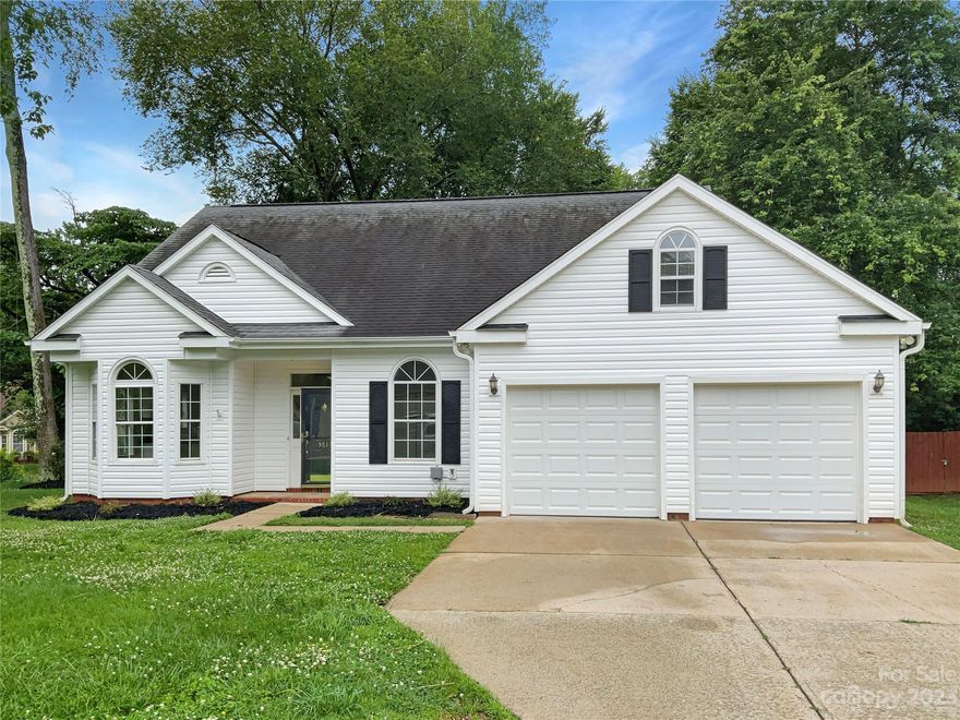 This beautiful home is the perfect place for anyone looking for a cozy, comfortable living space. It features a natural color palette throughout, creating a calming atmosphere. The kitchen boasts a nice backsplash and plenty of storage. Relax in front of the fireplace in the living room or use the other rooms for flexible living space. The primary bathroom includes a separate tub and shower, double sinks, and good under sink storage. Step outside to the sitting area in the backyard and enjoy the fresh interior paint. This home is a great option for anyone looking for a peaceful and tranquil atmosphere.