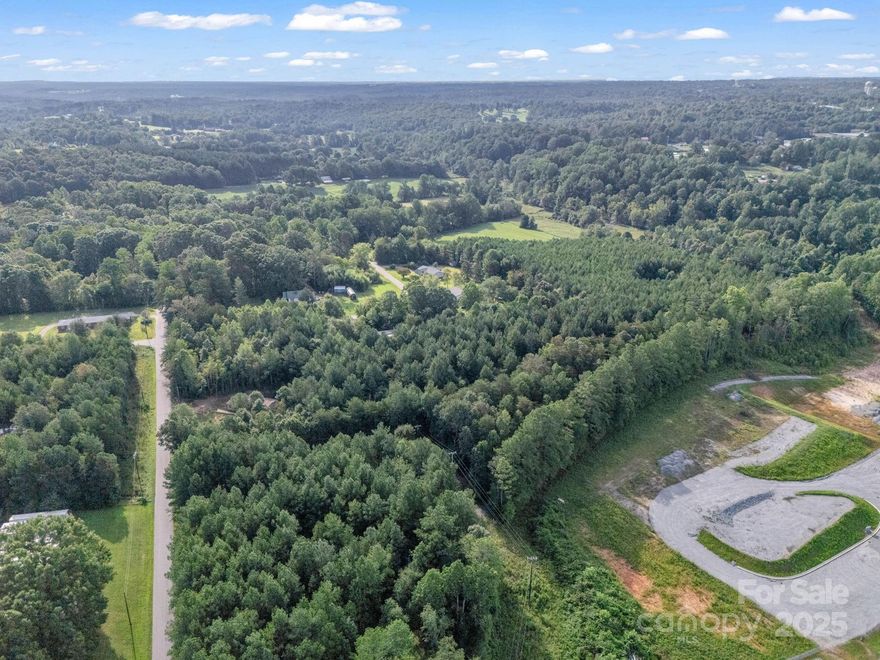 Excellent opportunity to own over 14 acres of wooded land, offered as three combined parcels. This property provides a versatile setting—ideal for building your dream home, establishing a private retreat, or clearing space for horses and recreational use.

Located within walking distance to the Rails for Trails (a paved pathway stretching from Gilkey to Forest City), outdoor enthusiasts will love the convenience of biking, running, or walking just steps from home. You’ll also enjoy being just minutes from downtown Rutherfordton, with quick access to restaurants, shopping, and local amenities—all while maintaining a sense of peace and privacy. 

With its size, location, and flexibility, this property presents exceptional potential for a variety of uses. This property is truly a blank canvas, so bring your vision and make it your own!