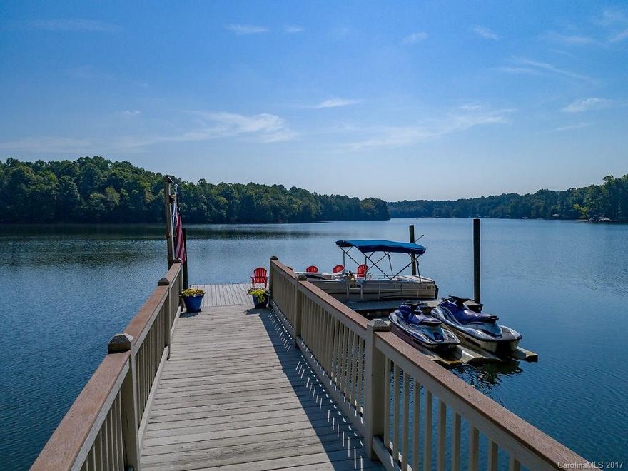 Reduced!Spectacular lakefront home w/unbelievable views of a quiet cove on Mt.Island Lake. 233 ft. of shoreline. Completely updated 4br/3.5bath bonus could be 5th br. Expect to be impressed when entering the master br w/sitting area and barn doors that lead you to a bathroom w/all the bells and whistles. Exceptional views across the lake of Latta Plantation from many rooms of the home. Basement could be used as mother-in-law suite w/kitchenette Feature sheet and floor plan included w/disclosures