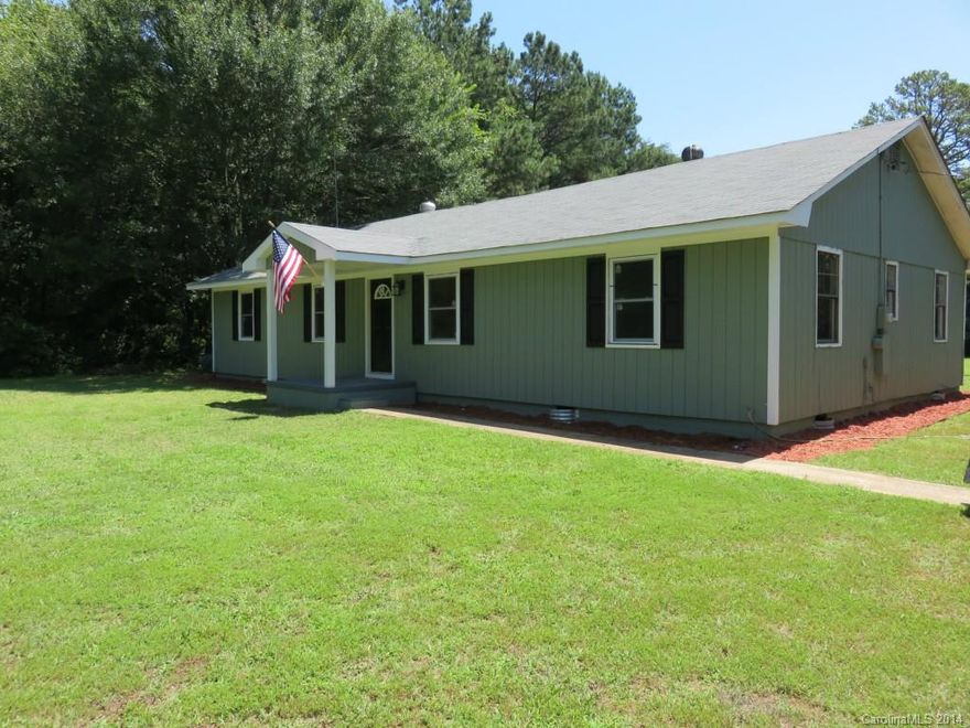 The home is being remodeled and updated, w/fresh paint (int.&ext.)-New double hung, low-E, vinly windows w/screens- new crown and base moldings, new tile, wood & carpet flooring. The kitchen will have all new cabinets, granite counter tops, SS appliances= Also new lites, doors where needed. The crawlspace is 9' hight. Great flat open/wooded property
