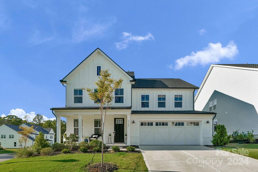 Gorgeous, modern farmhouse-style home built in 2023 featuring designer interior finishes & nestled in Toll Brothers' sought-after Ridgecrest neighborhood! Conveniently located near Charlotte's Ballantyne area offering shopping, dining, entertainment & quick highway access. Functional, yet elegant open floor plan on the main floor includes guest bedroom w/full bath, office, mud/drop zone, & impressive great room w/10-foot ceilings, gas fireplace & gourmet kitchen boasting large center island, wall oven, hooded gas cooktop & walk-in pantry. A lovely wood & iron stairway leads to the upper level presenting the luxurious primary bedroom w/tray ceiling, custom closet, & stunning en suite with free-standing tub, seamless glass/tiled shower & double-sink vanity. Three additional bedrooms w/large custom closets, two full bathrooms, loft area, & laundry room complete the spacious second floor. Low Lancaster County, SC taxes.