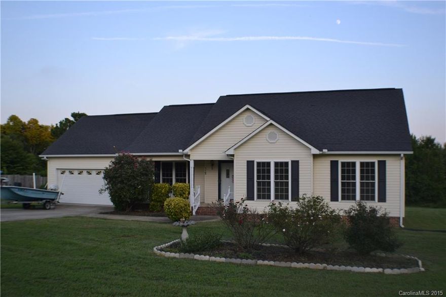 This meticulously maintained ranch style home features an open floor plan with wonderful natural lighting and neutral colors. Largest lot in neighborhood with over an acre of land! Fresh paint and brand new carpet throughout. Master bedroom offers a double sinked bath and large walk-in closet. Attached double garage. Very well kept, great condition and ready for a new owner! Conveniently located close to High Rock Lake, Dan Nicholas Park, and Rowan County Schools. Don't miss out on this home!