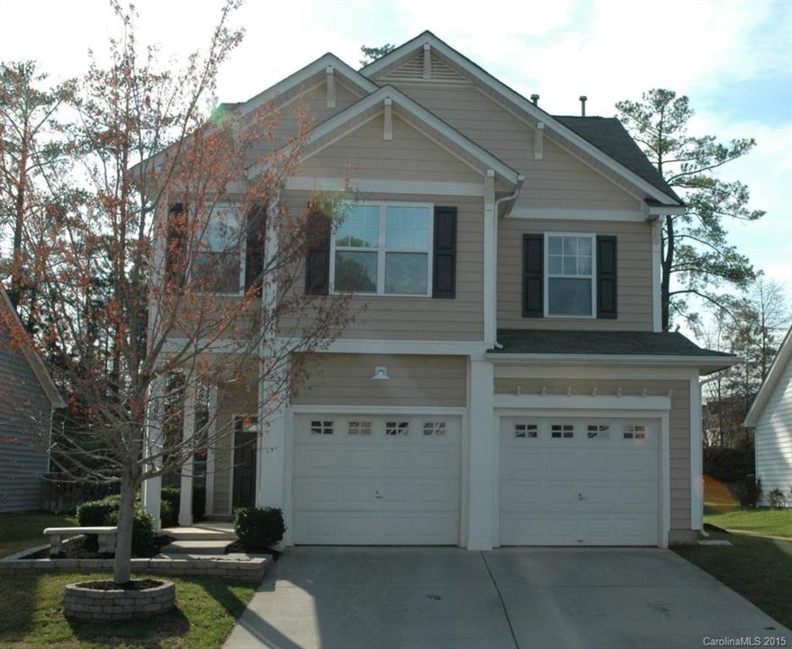 Beautiful 4 BR home with a large flat backyard! Glare protected windows, 9 foot ceilings, upgraded kitchen cabinets w glass block windows above for added light, breakfast bar has pendant lights. Convenient work island complete the kitchen. Generous size Master BR has trey ceiling. Bath has garden tub and separate shower, water closet, linen closet and large walk-in closet. The other 3 br are very nicely sized. Extra shelving built in the attic for storage. The home has just been freshly painted!