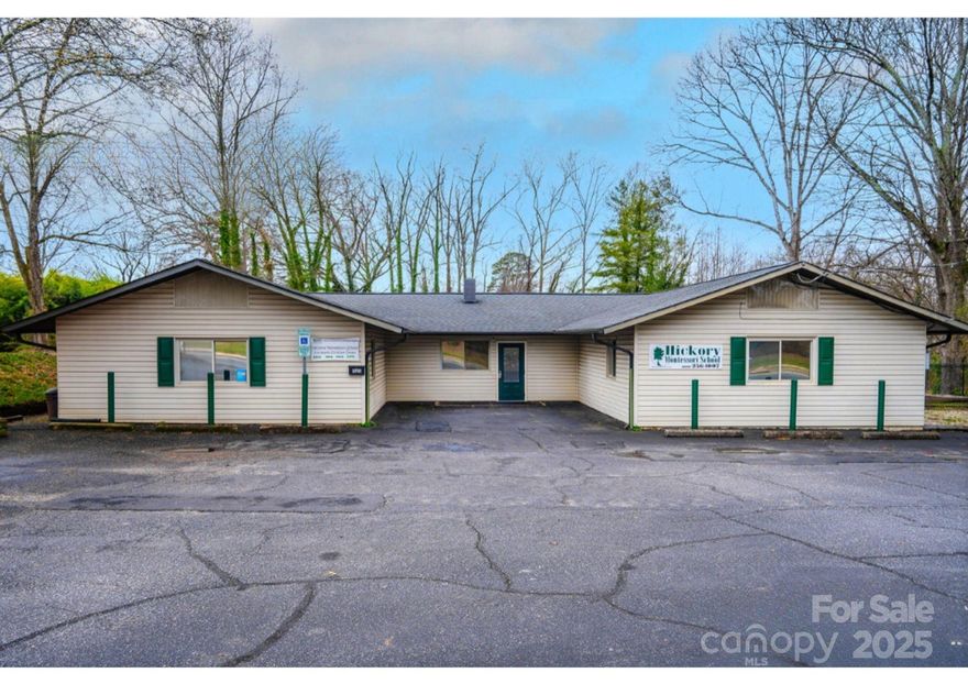 Prime commercial opportunity in the heart of Hickory! This versatile property offers excellent visibility and accessibility, making it ideal for a wide range of business uses. Previously utilized as a school, the building provides a functional layout with multiple rooms, open areas, and flexible space that can be adapted for offices, educational use, medical, retail, or specialty business operations.
Situated on a sizable lot with convenient access to major roads, the property offers ample parking and room for future improvements. Investors and owner-users alike will appreciate the potential for strong returns in this growing market. Whether you are expanding your portfolio or seeking a location for your business, this property is a rare find in an established Hickory corridor.