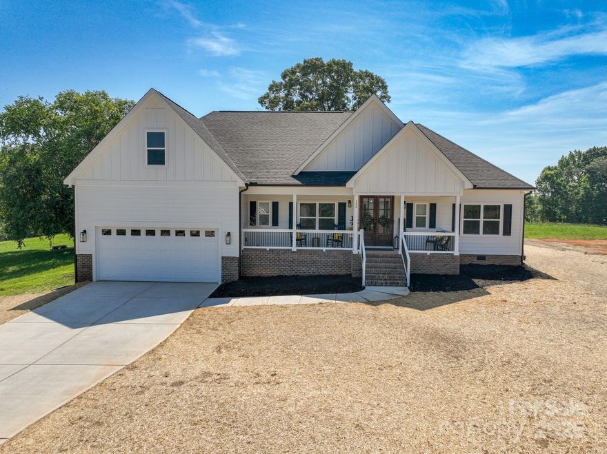 Fabulous golf course home featuring impressive vaulted ceiling,  kitchen with all upgraded stainless appliances, large walk in pantry, soft close cabinets with undermount lighting and beautiful quartz countertops.  Upgraded baths with tile showers.  Primary bath features a 54 x 70 Walkin shower with tile to the ceiling.  Huge back porch with ceiling fans and awesome view of hole 16 on the Woodbridge Golf Course.  Seasonal views of Kings Mountain and Crowders Mountain.  Electric fireplace for those cold nights.  Too many upgrades to mention but a must see.  Priced below appraisal.  Home is new construction so tax value is not available yet.   Yard just graded, seeded and professionally landscaped.