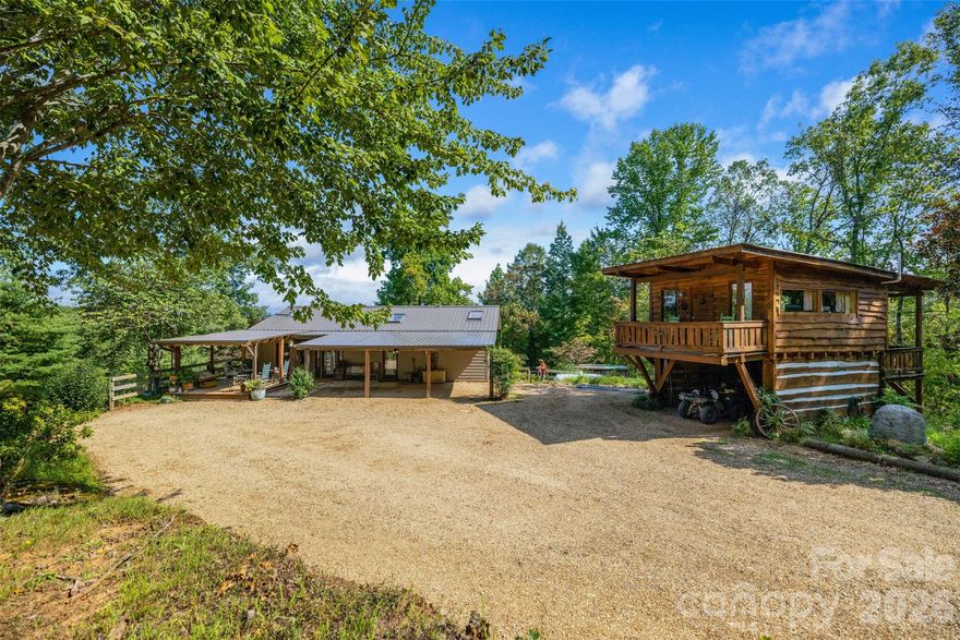 Horse property in Polk County perched on 25 acres combining 2 fenced-in pastures with plenty of space to expand, this custom retreat is built for people who live outside. A private, half-mile winding drive leads past a 60' x 40' workshop with a wonderful apartment for visiting family, friends or Short Term Rentals, before continuing on to the main house with long range mountain views. - Your perfect base camp after a day in the saddle or hiking on the trails.

Step inside and you’re greeted by open ceilings lined with pine tongue-and-groove boards, hand-hewn oak beams, and an artful wood stove surround. The open floor plan invites gatherings, while the main-level primary suite offers a walk in shower with all new countertops and sinks. Every detail, from boot-friendly entrances to gear-ready storage, is designed for life lived in muddy boots and trail dust. Year-round and winter mountain views frame the backdrop.

 
Built for Horses, Trails & Creativity with a private 1/2 mi. trail on property, close proximity to FETA trail access and a new 5 mile Polk County Mountain biking trail, all within 12 mins to Tryon International Equestrian Center, 20 mins to Lake Lure, 1hr to Greenville or Asheville and less than 2 hrs to Charlotte.

-Two fenced-in pastures (approx. 6 acres) with a custom two-stall stable, wash room and tack room — perfect for daily turnout or trail horses.
- Recently installed 190'x 85' arena below main house pasture.
- 2 Run-ins
- Loop trail that crosses a small creek around the perimeter of property suitable for Horse Riding/ Hiking.
- A 60' x 40' workshop - a dream space for additional horse stalls /tack storage, woodworking, welding, or ATV maintenance — with an attached apartment for guests or multigenerational living.
- Two separate living spaces — great for full time living, visiting riders, or potential seasonal rental income.

 Recent Upgrades:

-All-new double-insulated windows (Sept. 2025)
-High-efficiency HVAC system (Sept. 2025)
-New tankless hot water heater
-Expanded Septic Field for the main house and separate septic system for garage apartment on file with Polk County

-Unpermitted, finished storage space above garage/ carport. 

This isn’t just a house — it’s a working mountain hideout, a gathering place for horseriders, mountainbike riders, makers, and adventurers. Whether you’re training horses, building gear, or hosting friends, this property is ready for it all.