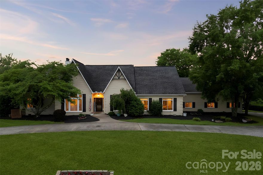 Welcome to 231 Pennington Road, where everyday living feels connected to the outdoors. Situated on 2.27 acres overlooking a peaceful pond with year-round water views, this property offers a setting designed for gathering, relaxing, and creating lasting memories. 
The backyard retreat is built for enjoying every season, featuring a saltwater pool, oversized deck, two built-in fire pits, and an in-ground gas grill.  Creating multiple spaces to entertain or unwind. 
Inside, this full brick home offers approximately 3,997 total heated square feet with an open layout, kitchen island, study, sunroom, and multiple spaces designed for both everyday living and hosting guests. The main property includes 3,268 square feet, one and a half story, offering 3 bedrooms and 2 full / 2 half baths. 
A standout feature is the connected second living quarters with a separate entrance, kitchen facilities, and living space hosting 729 square feet with a full bedroom and bath.  Offering flexibility for a variety of living arrangements and uses. 
Additional features include detached garage parking, circular driveway, RV parking access, fireplaces, and a location within Silver Lakes with convenient access to surrounding amenities.