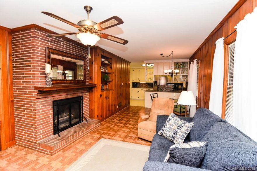 Newly Remodeled Brick Ranch with Basement on Six Acres!  All of the Charm of a Classic Brick Ranch with the Modern Conveniences of a Gourmet Kitchen with New Stainless Steel Appliances.  Enclosed Sunroom, Gorgeous Site Finished Red Oak Hardwoods in the Family Room and Bedrooms, Custom Built Brick Fireplace, and Warm Knotty Pine Tongue & Groove Walls.  Partially finished Basement with Full Bath, Fireplace, and HVAC could be easily finished for another 1600+ SF!