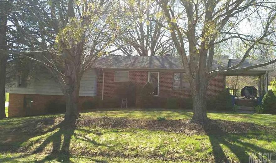 SPACIOUS home on a beautiful half acre corner lot.  The mature trees on this property are a dream and provide plenty of shading in front and back yard. 3 bedrooms and 2 full bathrooms.  There is a bonus room which could be an office. Hot water heater (gas) installed in 2010.  AC unit less than 10 years old.  Central heating - gas - installed in 2010.  The basement runs the length of the house and offers an incredible amount of storage space - also has one garage door.  2 covered patios - one is attached to the Master bedroom. Newly painted kitchen and freshly painted cabinets also. The kitchen is large and open.  Could be eat-in and also space for a formal dining area.  All appliances stay.  Exterior to be painted prior to closing. There is a well on the property.  Not currently in use but it's still operable and could be utilized for irrigation or gardening.  Great location - easy access to Highway 321.