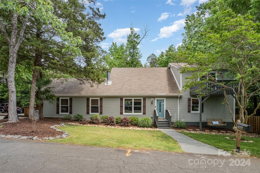 Welcome to this beautiful home, located deep in the original roots of Tega Cay. If you are ready to start living the Lake Life, you've found it! The perfect blend of comfort and functionality, with an open floor plan, 3 BRs, 2 bathrooms & bonus room, that can be used as a 4th BR/office/playroom. A highlight of this home is the main bedroom oasis located on the 2nd floor, offering a peaceful retreat from life's hustle and bustle. With ample space, natural light, and thoughtful design, this sanctuary provides a tranquil escape for relaxation and rejuvenation. Once outside you'll discover a spacious backyard enclosed by a 6-foot shadow box fence, as well as, an expansive private concrete slab that offers versatile parking options(rare here!) or a space for outdoor activities like basketball or pickleball. Additionally, the property boasts a generous oversized garage, for not only your cars to fit, but a golf cart too! 

Tega Cay water views and sunsets from the balcony are awaiting you!