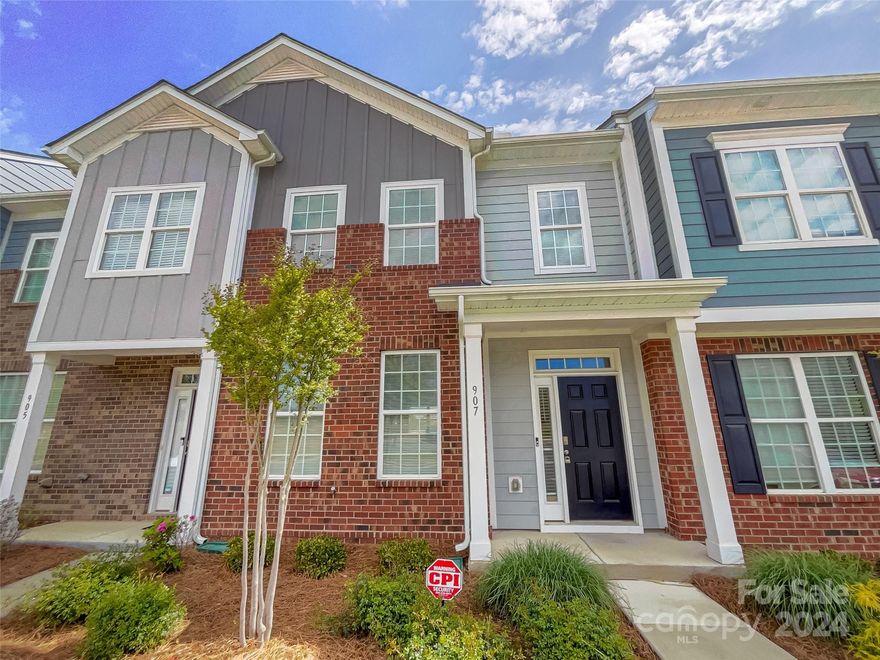 Welcome to this stunning property with a natural color palette that creates a serene atmosphere throughout the home. The kitchen features a center island and a nice backsplash, perfect for cooking and entertaining. Other rooms provide flexible living space to suit your needs. The primary bathroom boasts double sinks and good under sink storage for convenience. Enjoy new flooring throughout the home, adding a fresh and modern touch. Don't miss the opportunity to make this beautiful property your own!