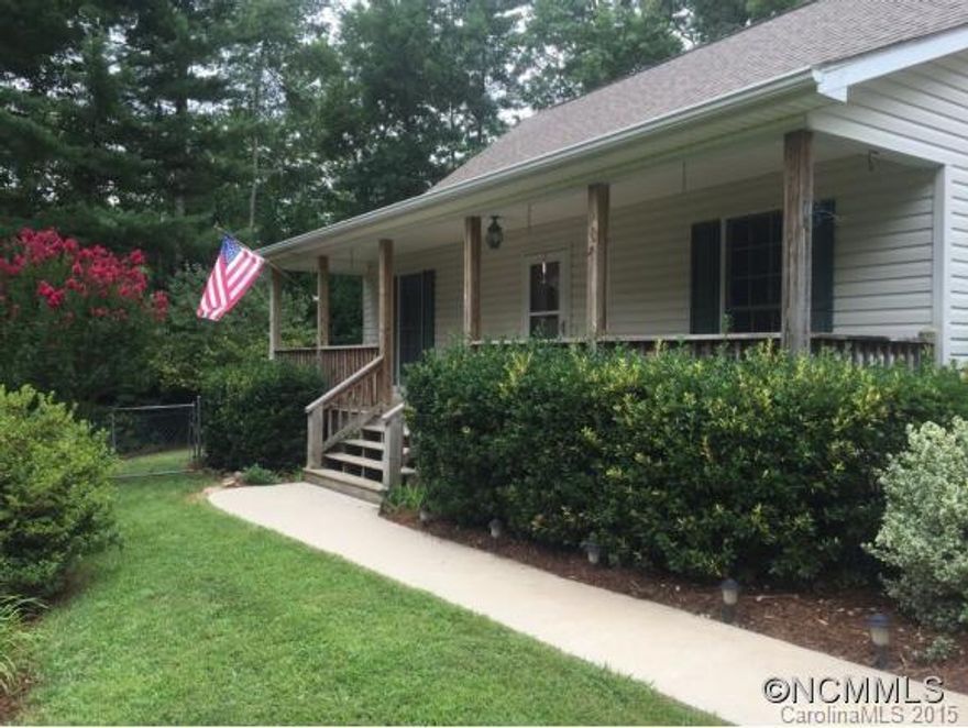 Absolute peace and privacy yet only 10 minutes to I-240.  Almost 2 acres of rolling gardens, fenced space, and beautiful blooming landscaping.  Inside you'll find freshly painted, open and spacious, light and bright, with fantastic space to entertain, cook, and relax!  Fantastic porches and decks and great trees welcome you home after a long day.  Great storage in shed and garage. Easy to show and pre-inspected (home, pest, radon, septic, well!)