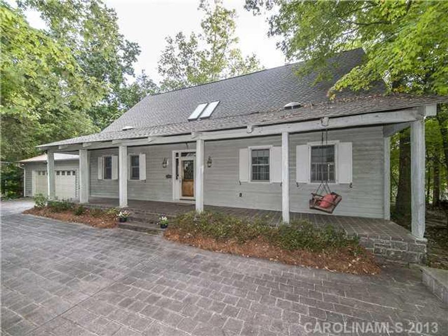 Unique custom home sits a hill with views of the 16th hole of award winning golf course from the sunroom. Marble, green onyx, granite, travertine counters and floors. Stacked stone fireplaces, granite foundation, patios, sunroom floors. Spectacular main floor living areas and historic touches throughout. It feels like a mountain retreat.  Must see virtual tour & visit to appreciate!