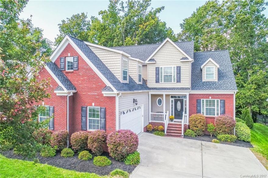 Custom home featuring interior upgrades & outdoor space for entertaining! The home backs up to woods for privacy and screened-in porch & back deck provide great outside living areas. Interior features hardwoods throughout living area on main, master on main, laundry with sink & cabinets, and large bonus room on 2nd floor.  Abundant storage available including walk-in storage with built-in shelving. Additional exterior features include side load 2 1/2 car garage & irrigation system.