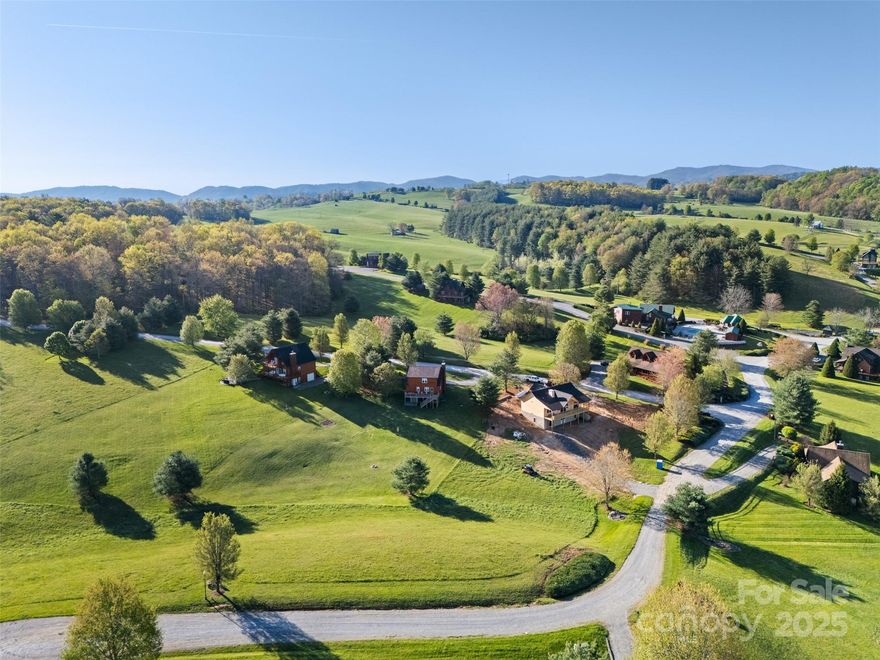 Excellent buildable lot on Pond View Ln in charming Bear Creek Subdivision. Level to rolling hill, pastured w/ a mix of Mountain, Pastoral & Pond views. Bear Creek is a gated community with well-maintained roads, community clubhouse/fitness room, in-ground pool, fishing pond, gazebo, firepit, basketball court, and little chapel on the hill. Underground utilities run to the lot. About 15min to quaint downtown Sparta for restaurants and shopping. Meanwhile the Jeffersons, Grayson Highlands State Park and Galax, VA are all within ~35min drive. The opportunities for outdoor recreation abound in this beautiful little pocket of NC and VA, with plenty of hiking trails and the New River nearby. Come see the beauty for yourself!