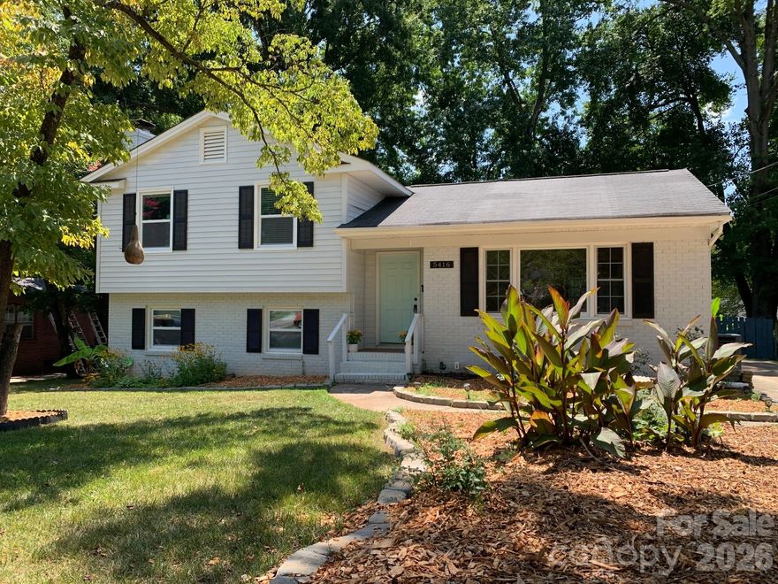 Timeless Brick Split-Level Home in Shannon Park. Welcome to this charming, well-maintained brick and vinyl split-level home in the desirable Shannon Park neighborhood. An elegant foyer welcomes you inside, where gleaming original hardwood floors and fresh interior paint enhance the home’s timeless character. The spacious sunken living room w/Large Picture Window is filled with natural light, creating an inviting space for both everyday living and entertaining. The home features a large eat-in kitchen with white shaker style cabinetry, granite counters, large kitchen island, stainless steel appliances, ideal for casual dining and large gatherings. Just off the dining area, French doors open to a bright sunroom, creating a seamless indoor-outdoor feel and offering a relaxing space to enjoy year-round.
The lower level offers exceptional versatility, featuring a spacious family room with a wood-burning fireplace, a fourth bedroom, full bath, and a dedicated laundry room w/access to back patio...ideal for guests, multi-generational living, or a private home office. The primary suite is located on the upper level and includes a renovated private bath. Additional bedrooms and 3rd full bath are also on this level providing comfortable accommodations for everyone.
Outside, enjoy a fenced backyard with an expansive concrete patio—ideal for entertaining, outdoor dining, or relaxing in a private setting. Situated on a generous lot in an established neighborhood, this property offers an excellent move-in-ready opportunity. The Shannon Park community also features a neighborhood pool available with initiation fee and annual membership dues. Don’t miss the chance to own this affordable, move-in-ready home in this sought-after East Charlotte location.