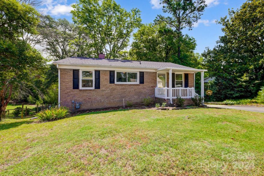 Great opportunity to own a property minutes from downtown Pineville! This quaint 4 bedroom/2 bathroom brick home offers lots of space including 3 bedrooms/1 bathroom on the main level plus living room, kitchen/dining area and a walk out deck overlooking the private backyard.  Beautiful hardwood floors on the main. The basement has a very large den that has enough space for multiple uses, a dry bar area, large primary bedroom w/ spacious walk in closet and a full bathroom. Walk out onto your patio and enjoy your own oasis. The home is move in ready or you can choose to update it as you see fit. It is priced accordingly for both options. Roof 2023. 
Great location...downtown Pineville is hopping, lots of exciting changes being made.  Walk to Pineville Elementary, minutes to Carolina Place, I-485, dining and entertainment. Hurry, you don't want to miss this one!